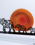 Steel decorative and gift item displaying three elephants arranged from largest to smallest, from left to right