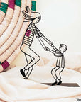 Steel decorative gift item showcasing a mother playing with her daughter