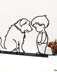 Steel decorative gift item featuring a boy and a dog looking at one another