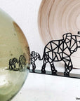 Steel decorative and gift item displaying three elephants arranged from smallest to largest, from left to right