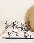 Steel decorative gift item featuring an energetic mom with her kids in the supermarket cart