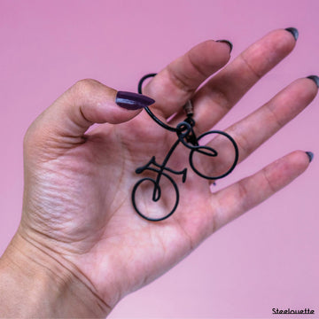 Steel decorative and gift keychain in the shape of a bicycle, perfect for cycling enthusiasts