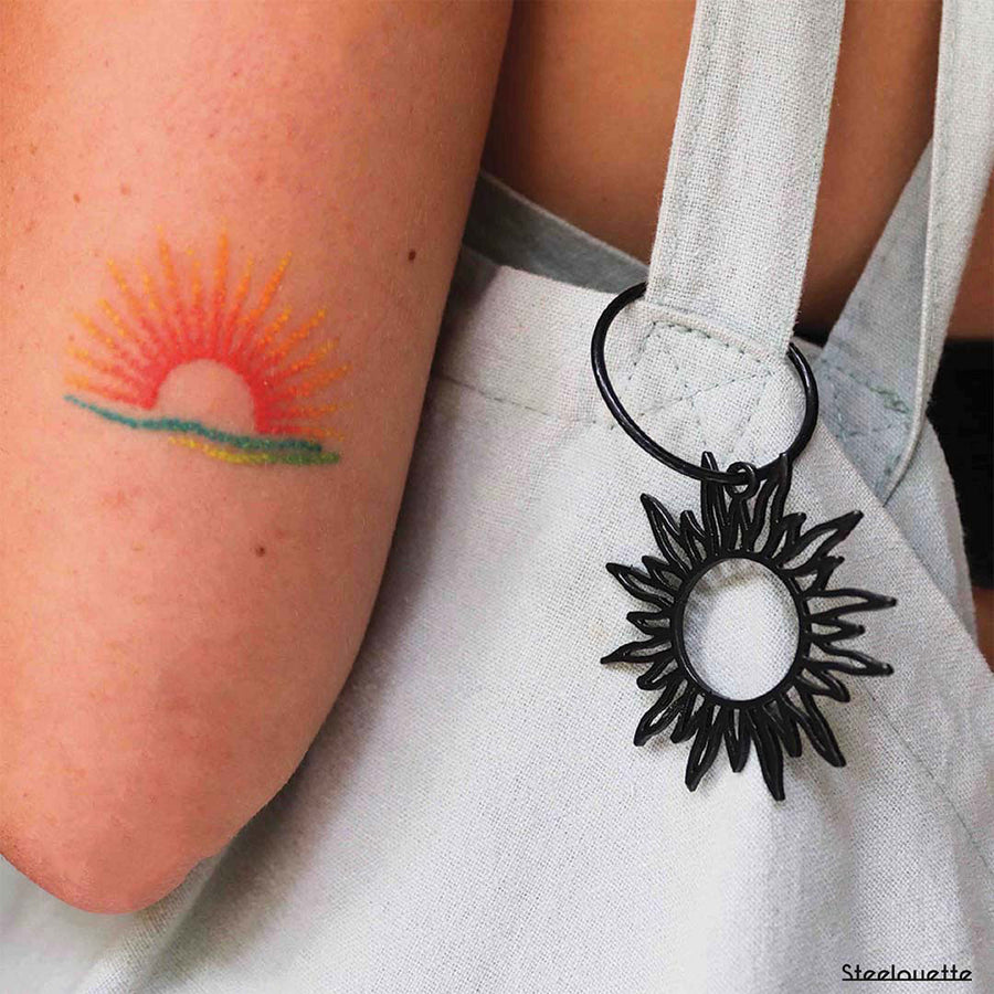 Steel decorative gift keychain in the shape of the sun