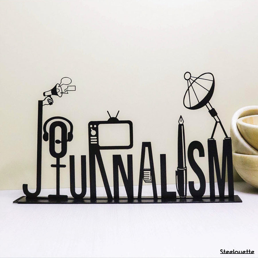 Steel decorative gift item featuring the word journalism.