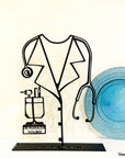 Steel decorative gift item featuring the lab coat of a doctor