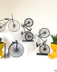 Steel decorative gift item showing the bike evolution
