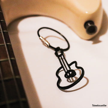Steel decorative gift keychain in the shape of a guitar