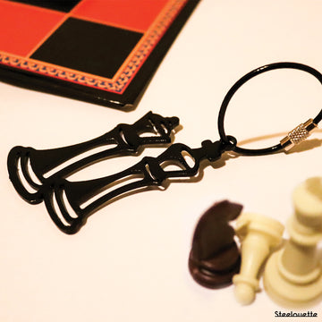 Steel decorative and gift keychain in the shape of two chess pieces