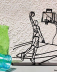 Steel decorative and gift item of a man playing basketball