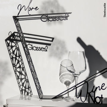 Modern design wine holder made of steel. A great gift idea for wine lovers and an original home decoration product by Steelouette.
